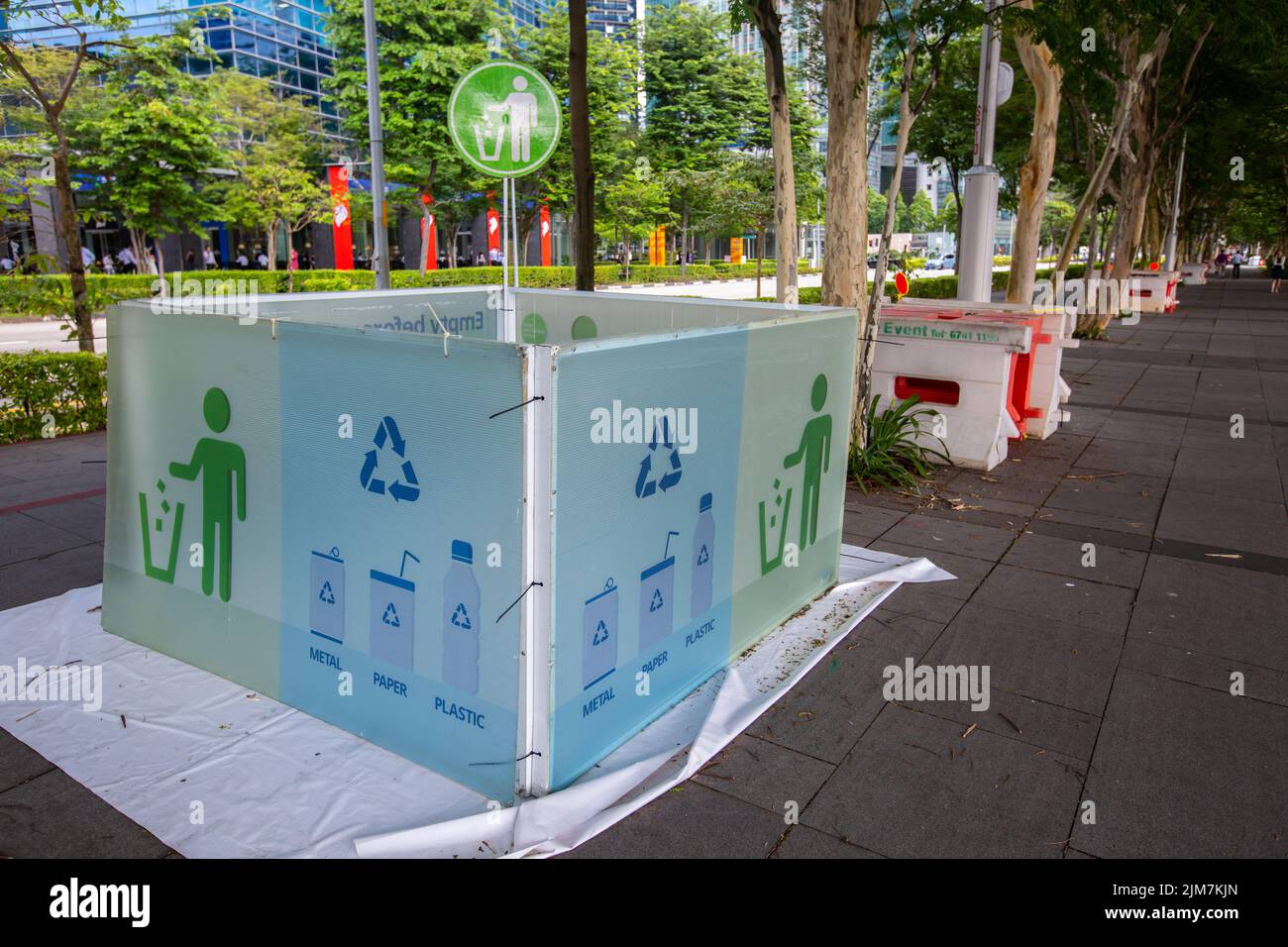 A huge bin collection point in public venue for people to recycle plastic bottles, paper cups or other recyclable material. Protect our earth. Stock Photo