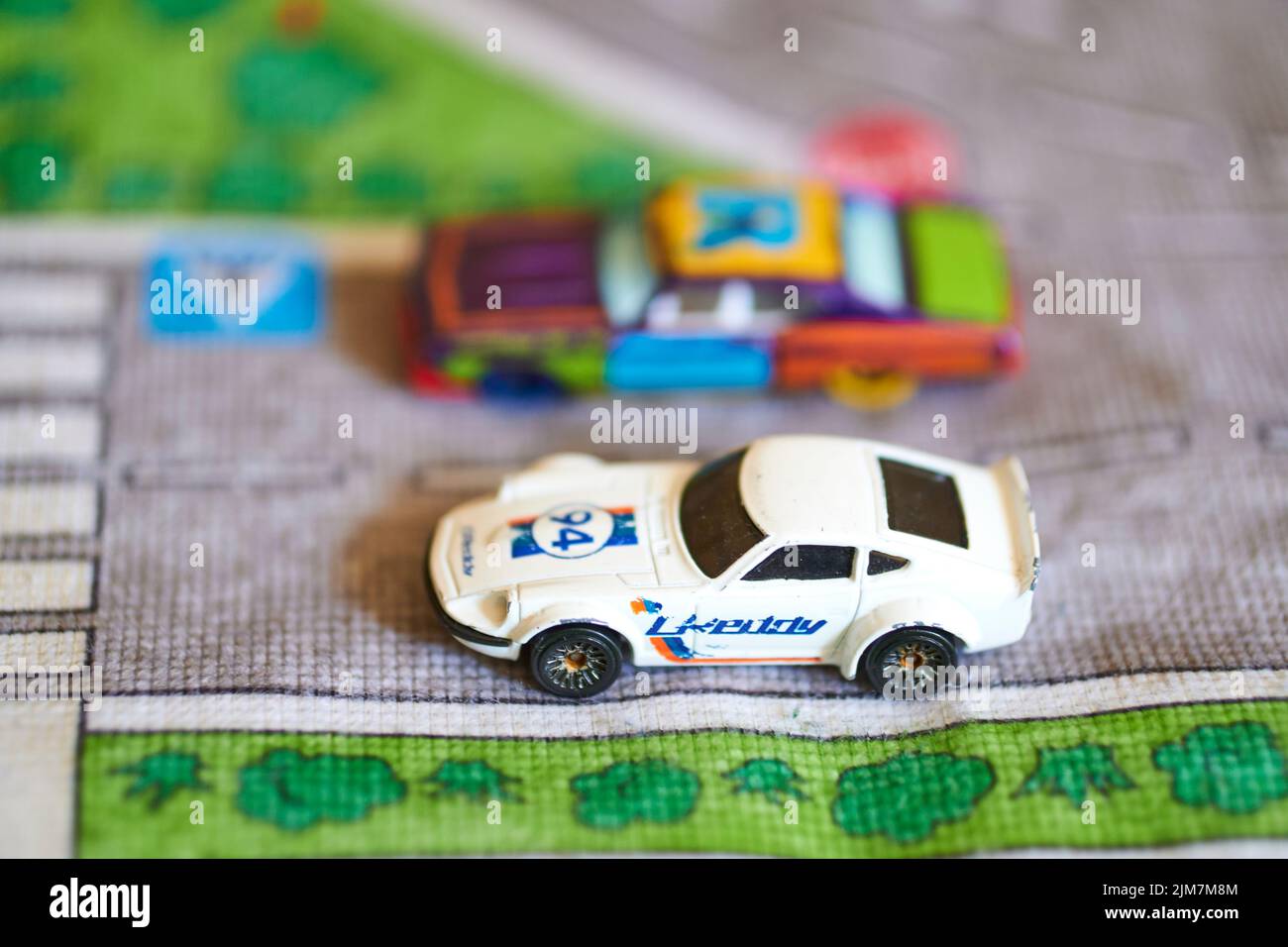 A view of Mattel Hot Wheels futuristic looking toy model cars on a play