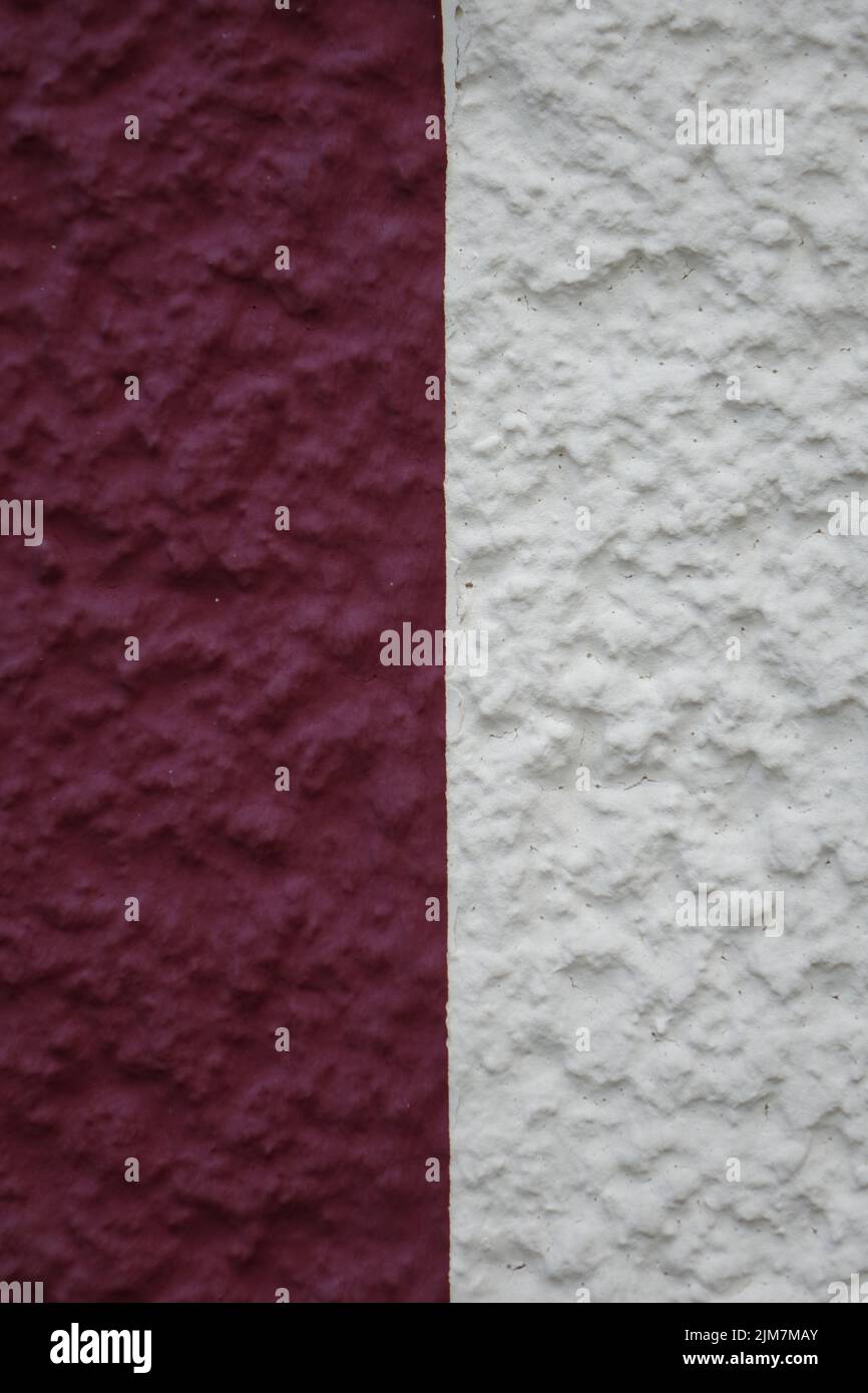 Red (left) and white (right) painted plaster on house wall, use: texture, copy space, background, concept: maritime design (vertical), Dahlbruch, NRW Stock Photo