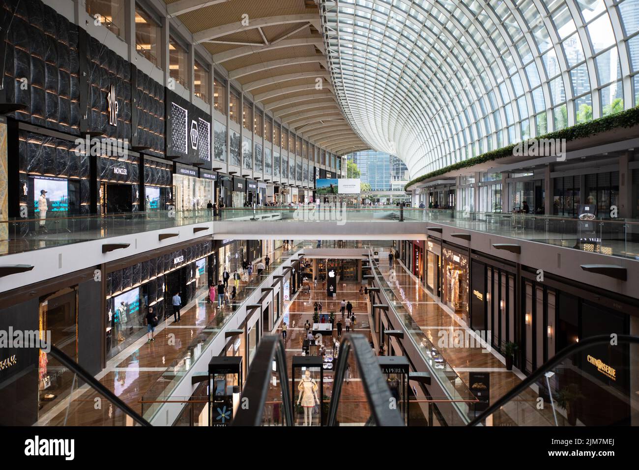 Marina Bay Sands is abundant with high tier luxury boutiques and restaurants to let the visitors soak in lush experience. The mall have a casino too. Stock Photo