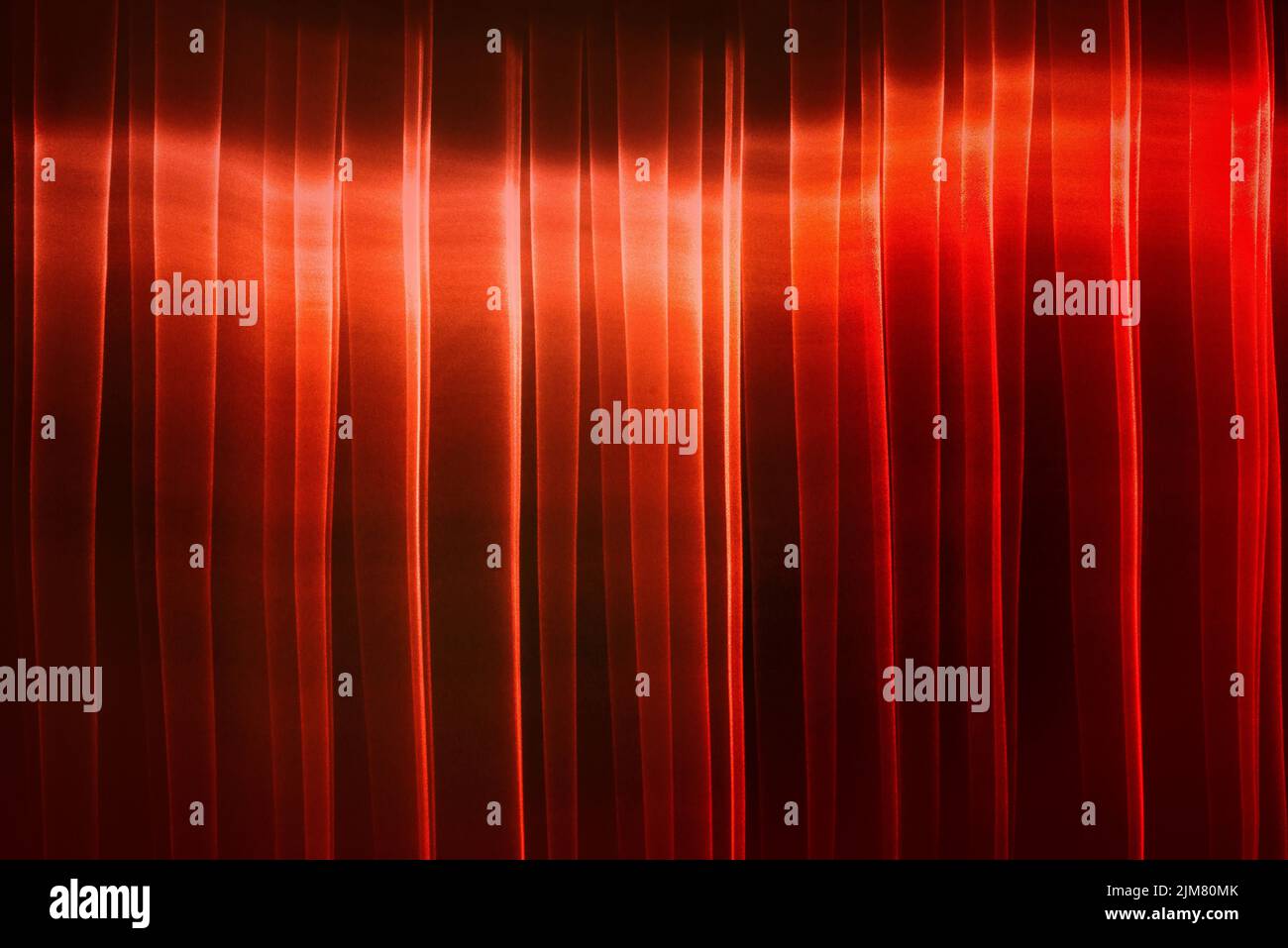 laser red lines creating a wall of light Stock Photo