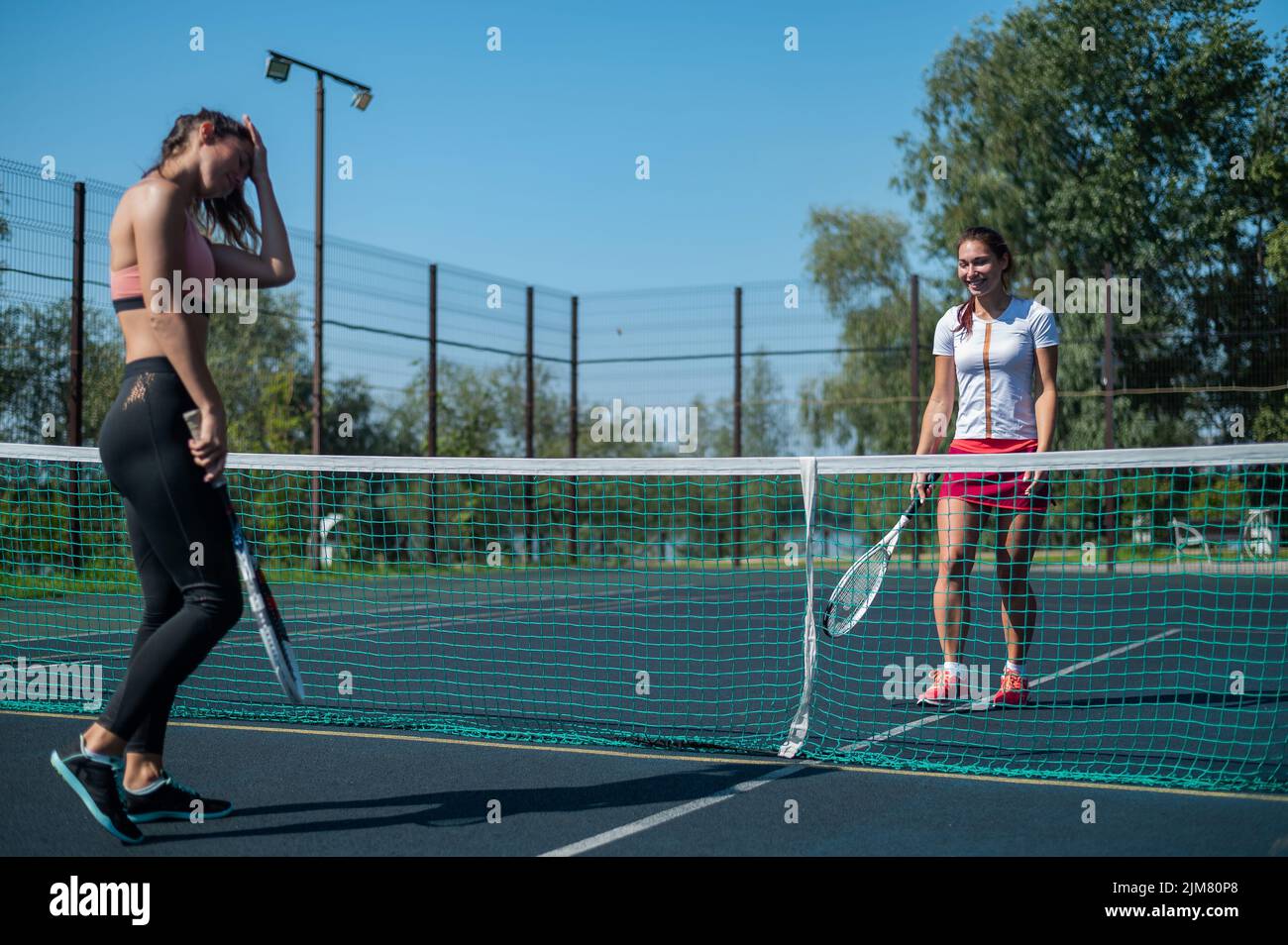 Woman team tennis outdoors hi-res stock photography and images - Page 2 -  Alamy