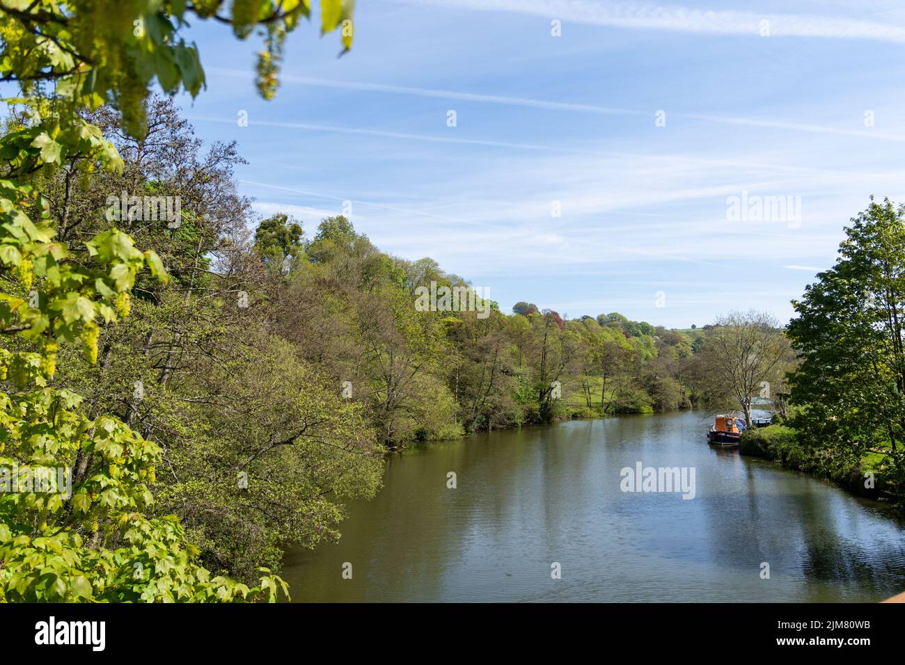 River Avon near Saltford, Bath, Somerset, on a spring day, with blue