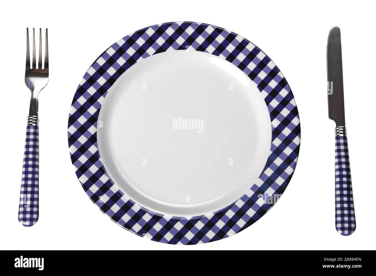 Dinner set (plate, fork, knife) Stock Photo