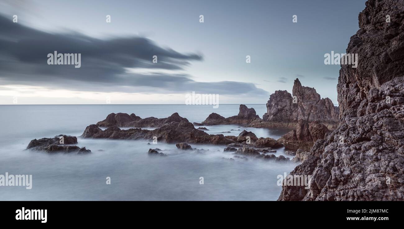 Panorama of rugged cliffs at sea Stock Photo