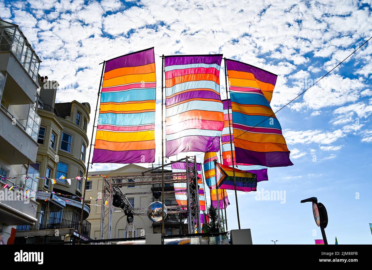 Brighton UK 5th August 2022 - Clubs and buildings around Brighton are adorned with flags ready for this weekends International Pride Festival . With good weather forecast large crowds are expected to attend the UK's biggest LGBTQ Pride festival : Credit Simon Dack / Alamy Live News Stock Photo