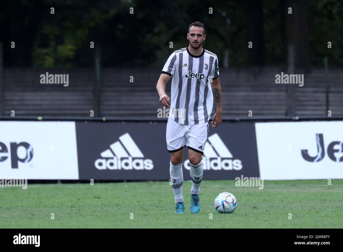 Federico Gatti of Juventus Fc controls the ball during the friendly match beetween Juventus and Juventus U23 at Stadio Comunale on August 4, 2022 in Villar Perosa, Italy . Stock Photo