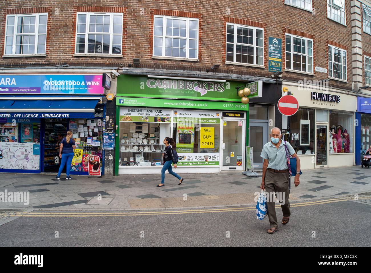 Slough, Berkshire, UK. 4th August, 2022. Shoppers in Slough High Street