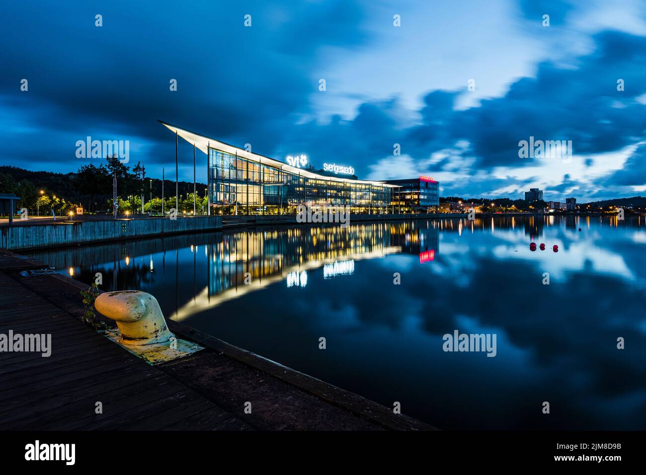 Reflection of building in river Stock Photo