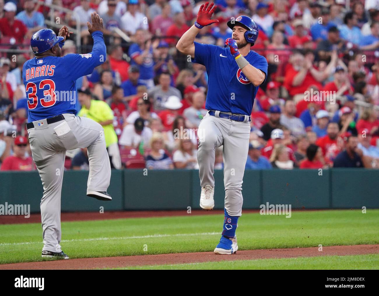 St. Louis, United States. 05th Aug, 2022. Chicago Cubs Patrick Wisdom celebrates his solo home run with third base coach Willie Harris in the first inning against the St. Louis Cardinals at Busch Stadium in St. Louis on Thursday, August 4, 2022. Photo by Bill Greenblatt/UPI Credit: UPI/Alamy Live News Stock Photo