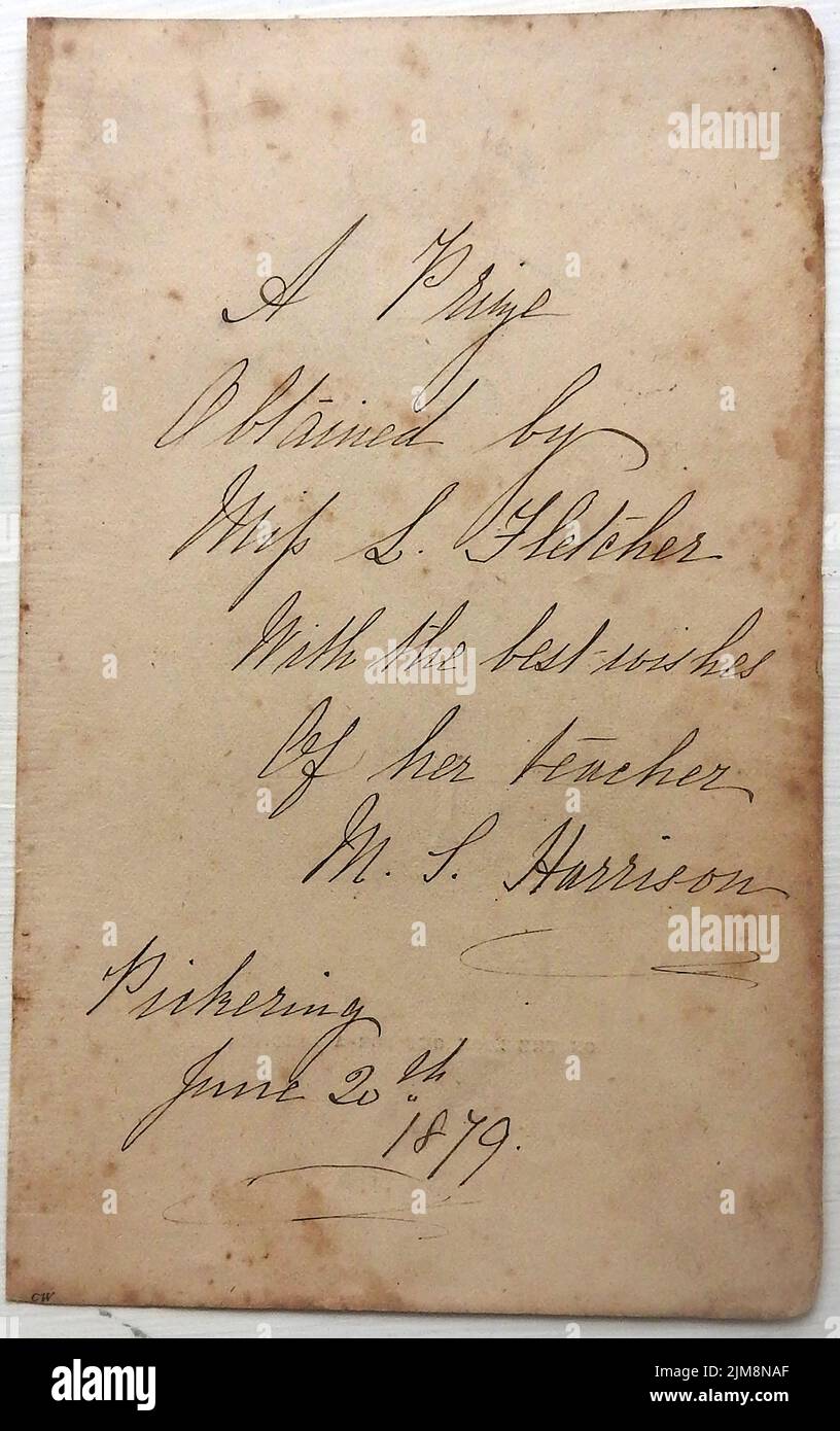 Pickering, Yorkshire UK. An 1879 book dedication (book prize) to a pupil  named Fletcher from her teacher  named Harrison Stock Photo