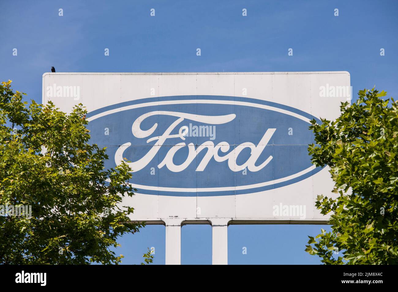 large advertising sign at the Ford automobile factory in the town district Niehl, Cologne, Germany. grosses Werbeschild an den Ford-Werken in Niehl, K Stock Photo