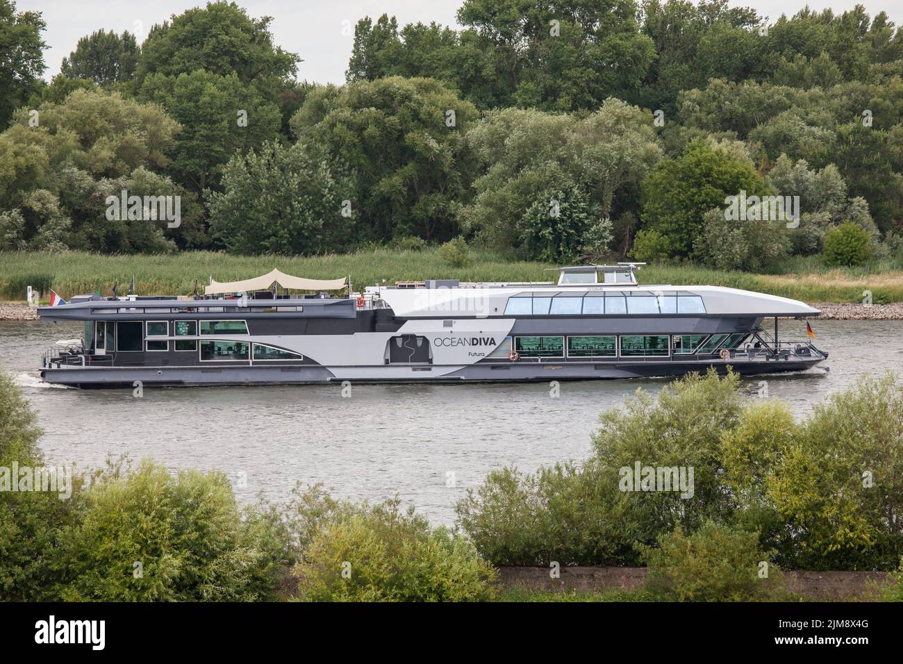 the event ship OceanDiva Futura on the Rhine in the district Niehl, Cologne, Germany.  das Eventschiff OceanDiva Futura auf dem Rhein bei Niehl, Koeln Stock Photo