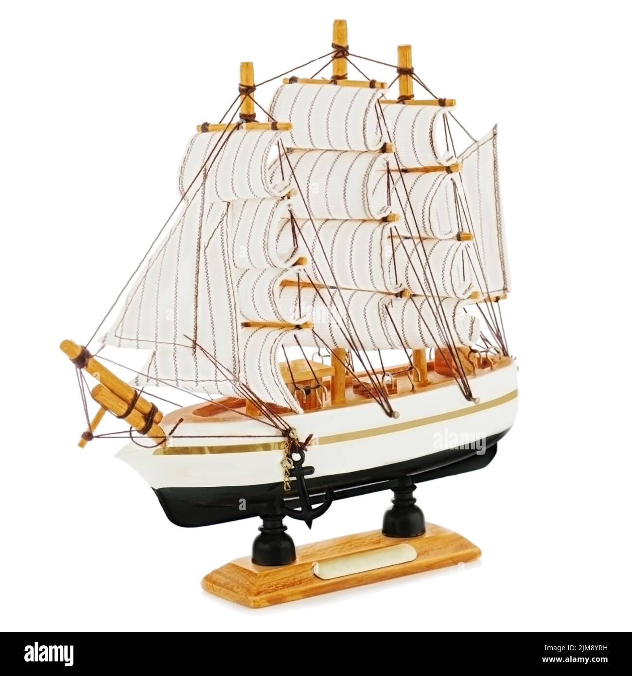Old sailboat model isolated on white background. C Stock Photo - Alamy