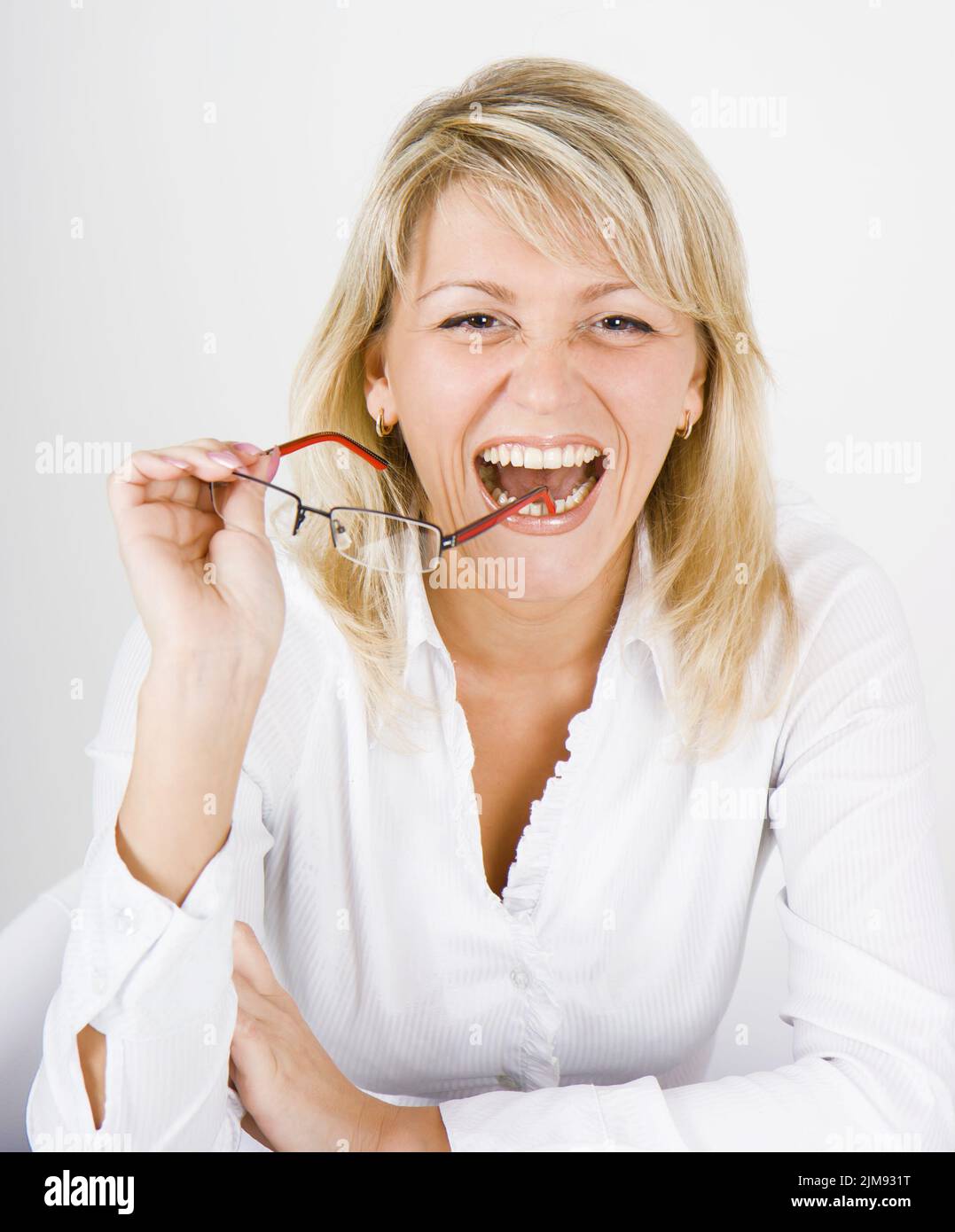 Happy blonde hi-res stock photography and images - Alamy