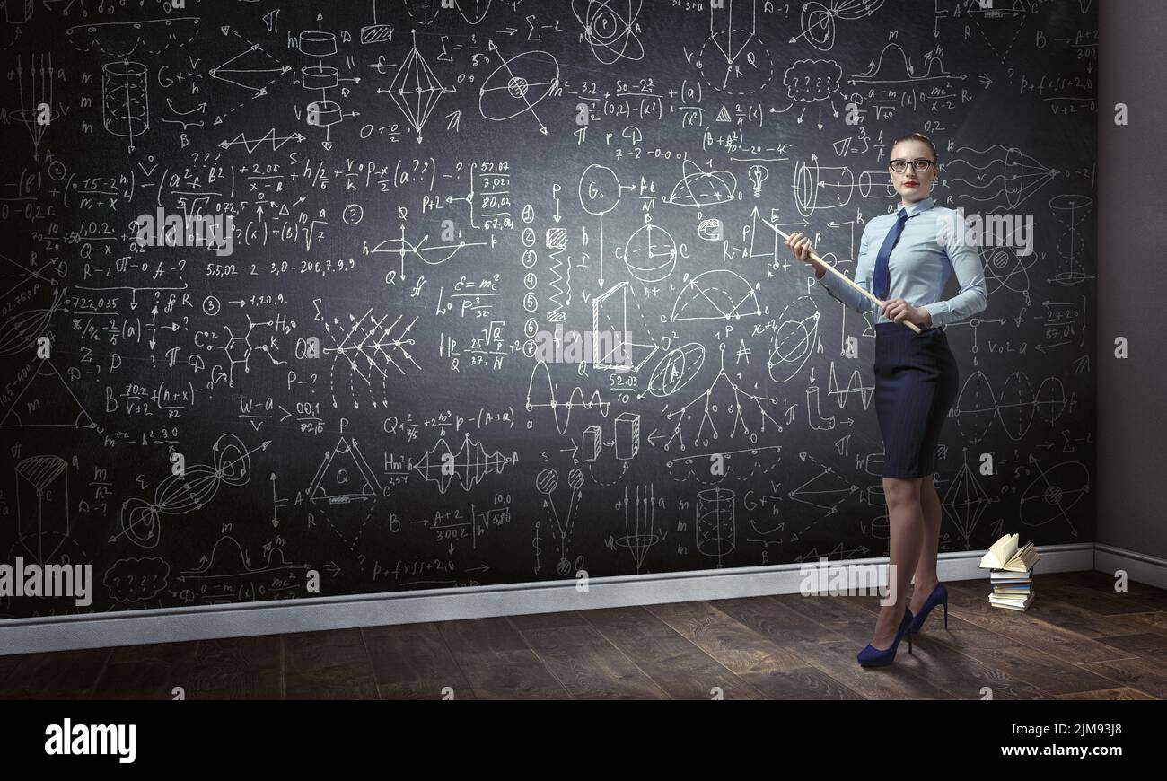 Strict female teacher . Mixed media Stock Photo - Alamy