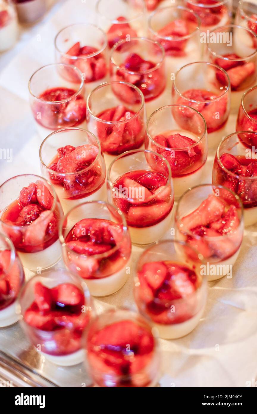 Cream desserts with strawberry Stock Photo Alamy