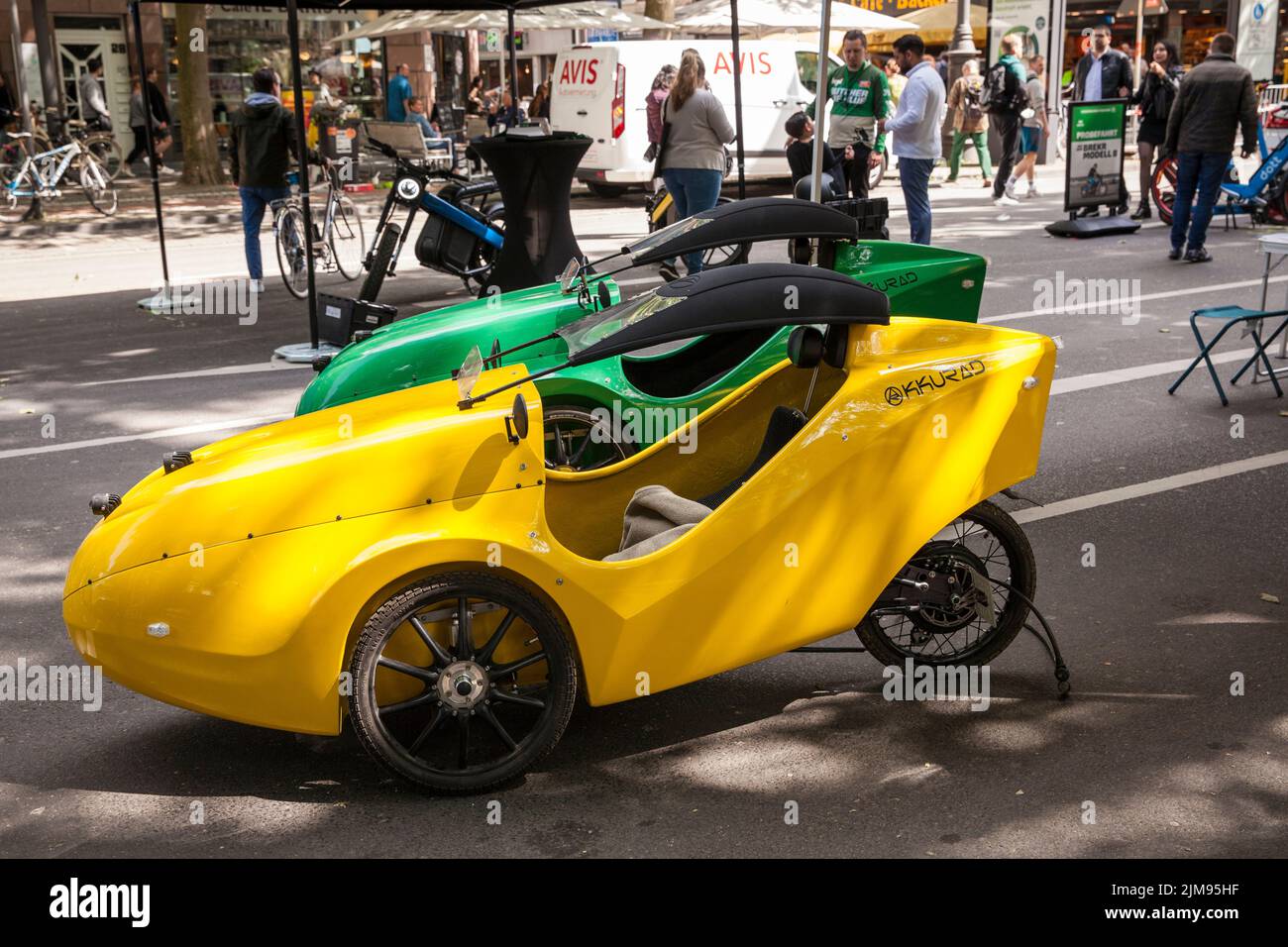 at the polisMobility Moving Cities fair exhibitors present different mobility concepts for the future, Cologne, Germany. Velomobile of the company Akk Stock Photo