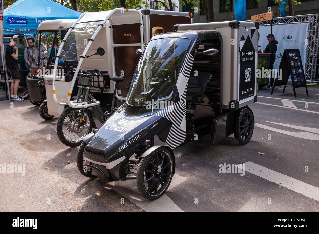 at the polisMobility Moving Cities fair exhibitors present different mobility concepts for the future, Cologne, Germany, the Citkar Loadster E-Cargobi Stock Photo