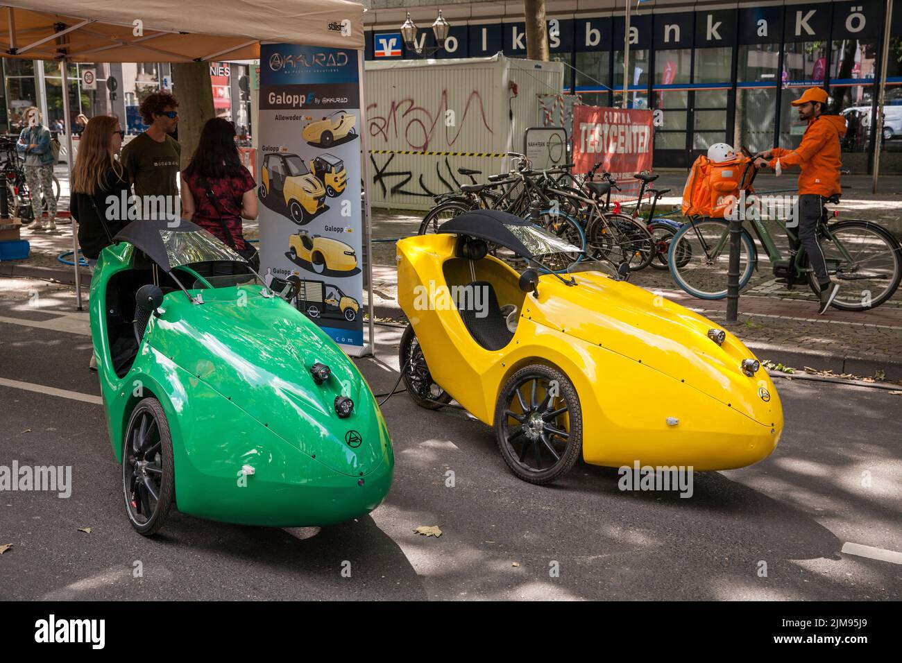 at the polisMobility Moving Cities fair exhibitors present different mobility concepts for the future, Cologne, Germany. Velomobile of the company Akk Stock Photo