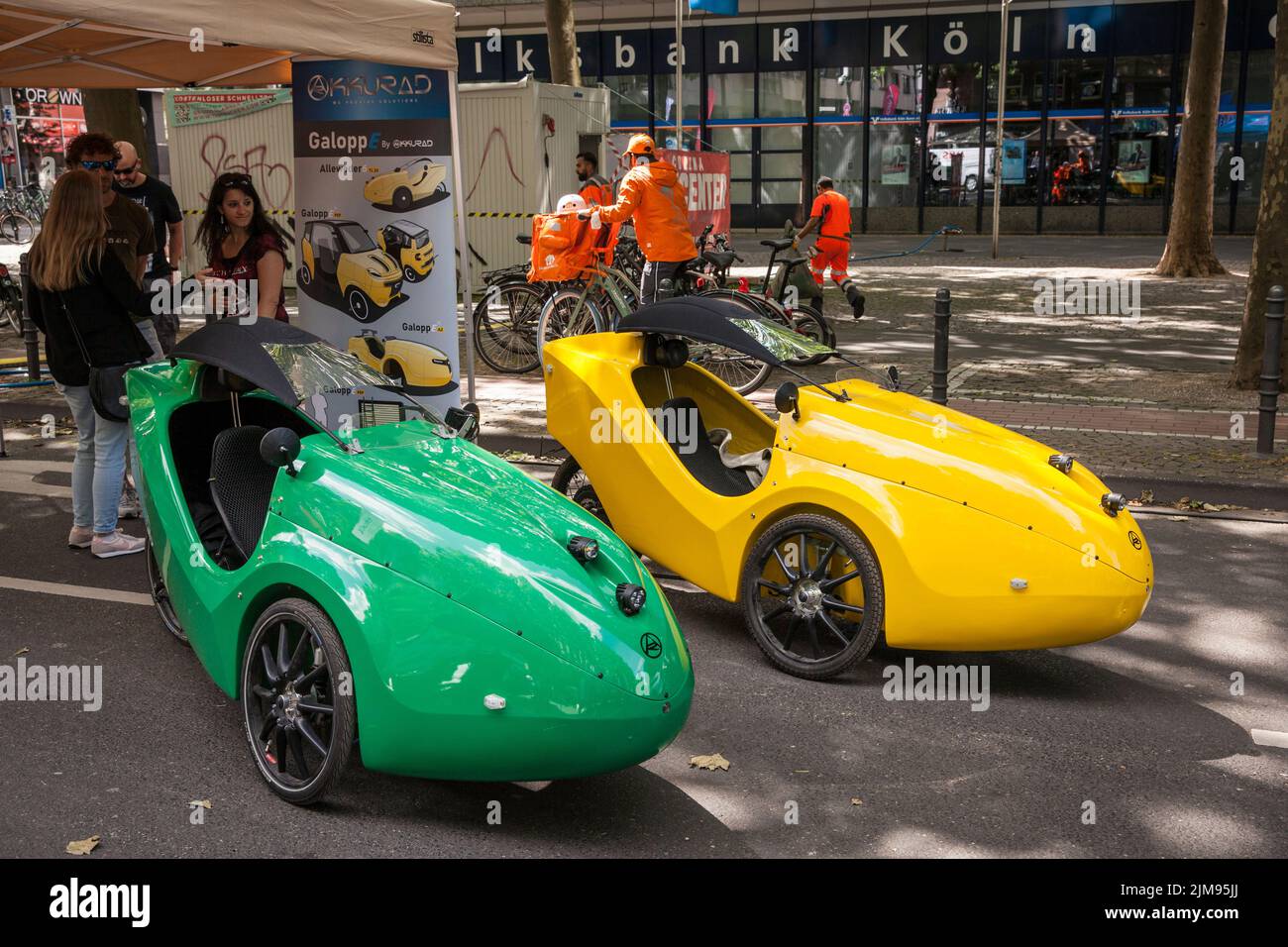 at the polisMobility Moving Cities fair exhibitors present different mobility concepts for the future, Cologne, Germany. Velomobile of the company Akk Stock Photo