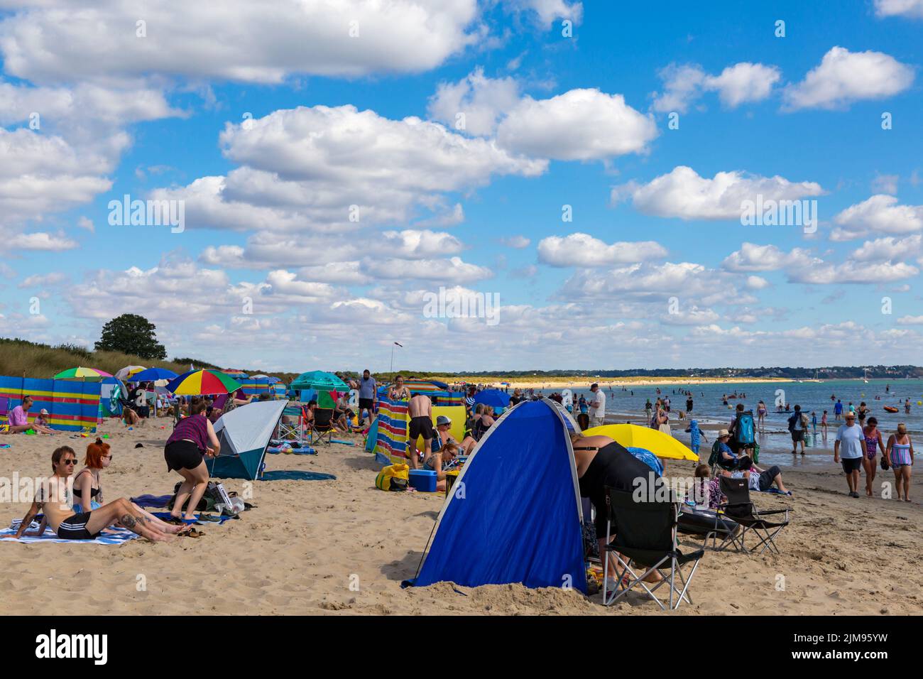 Knoll beach, Studland, Dorset UK. 5th August 2022. UK weather: warm and sunny at Studland beaches as sunseekers head to the seaside to enjoy the sunshine. Credit: Carolyn Jenkins/Alamy Live News Stock Photo