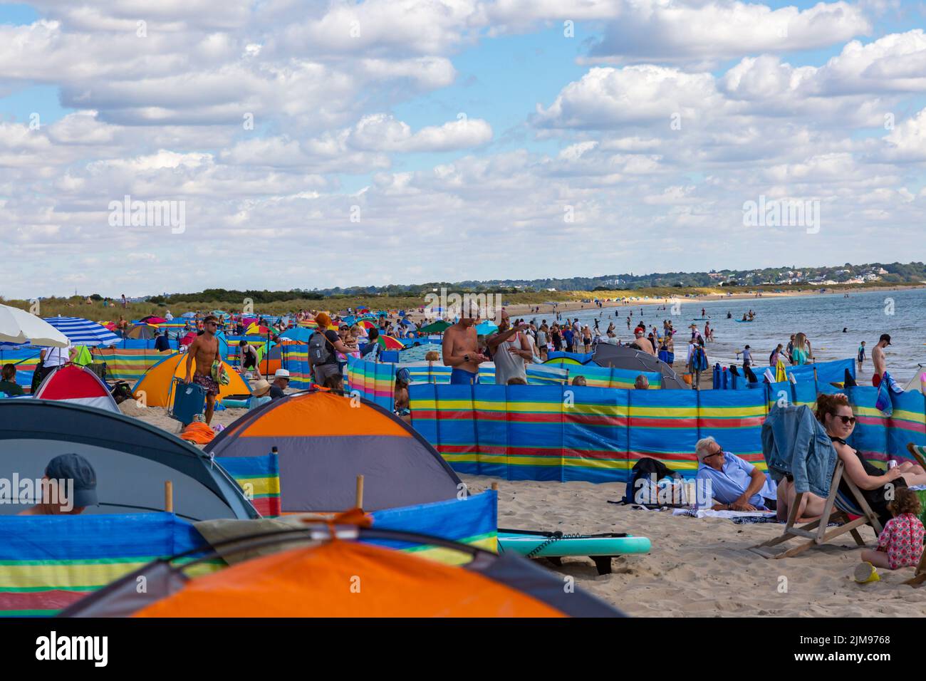 Knoll beach, Studland, Dorset UK. 5th August 2022. UK weather: warm and sunny at Studland beaches as sunseekers head to the seaside to enjoy the sunshine. Credit: Carolyn Jenkins/Alamy Live News Stock Photo