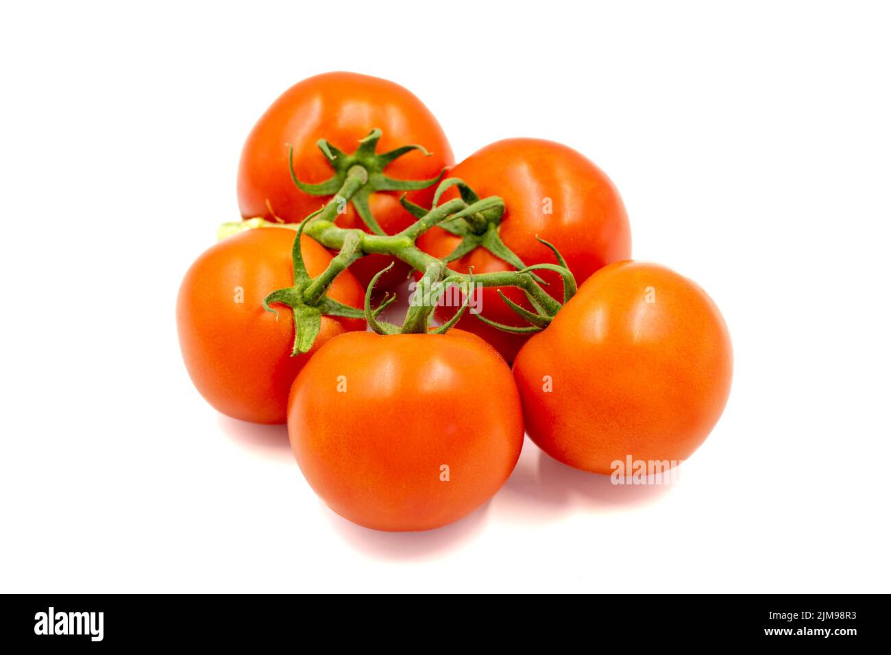 Bunch of tomatoes. Fresh tomatoes isolated on white background. Organic food. close up Stock Photo