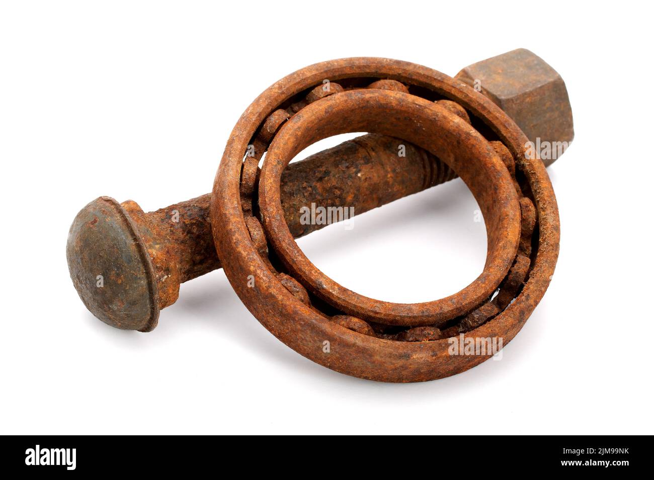 Rusty bearing and nut bolt isolated Stock Photo
