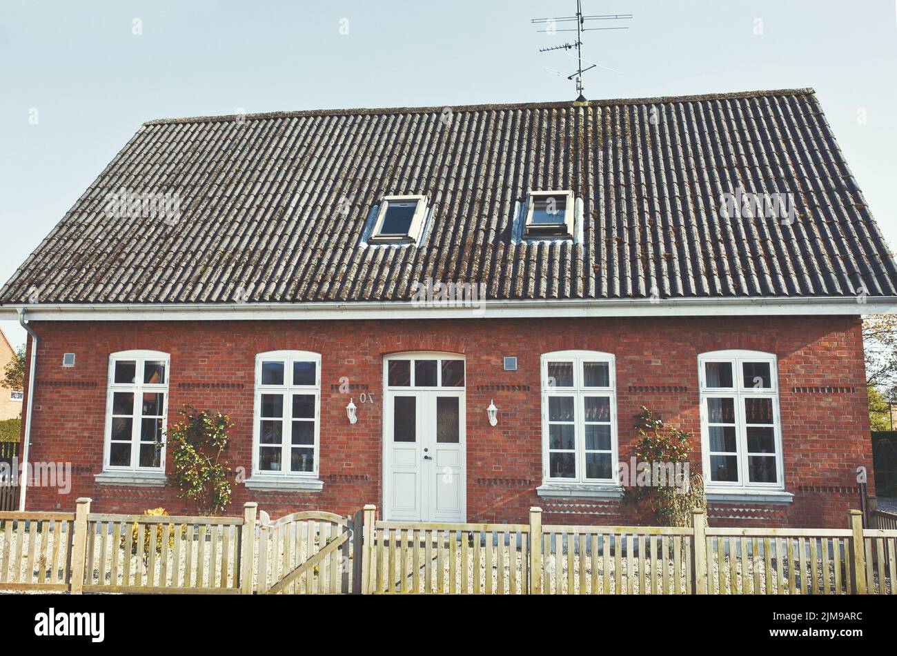 Facade of a small house Stock Photo - Alamy