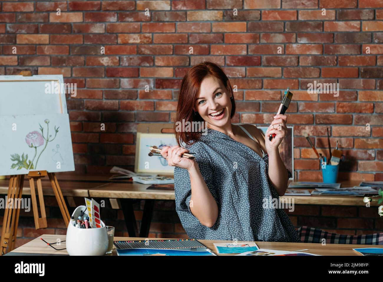 art therapy stress relief female extend paintbrush Stock Photo