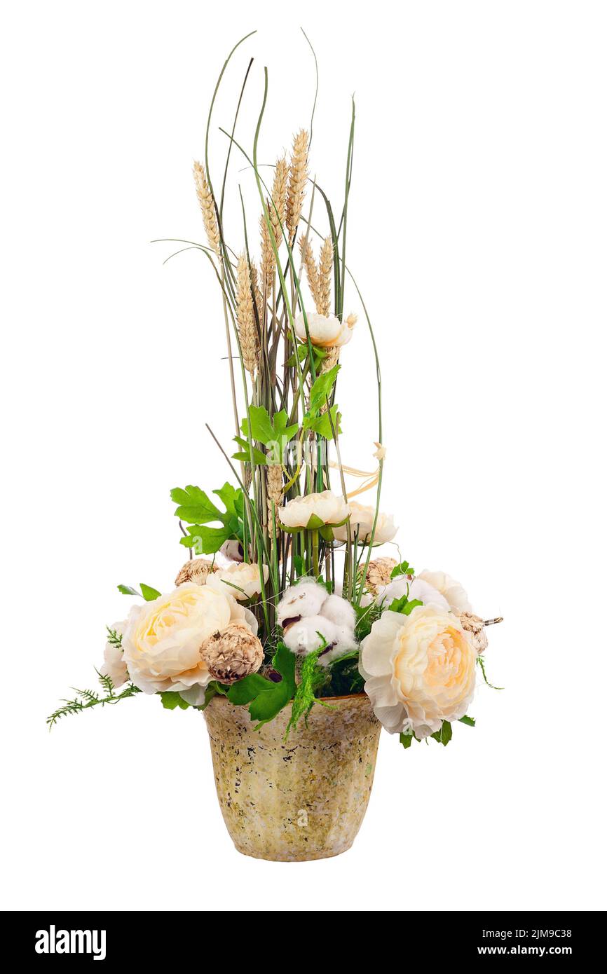 Bouquet from peony flowers, cotton balls and ears of wheat. Stock Photo