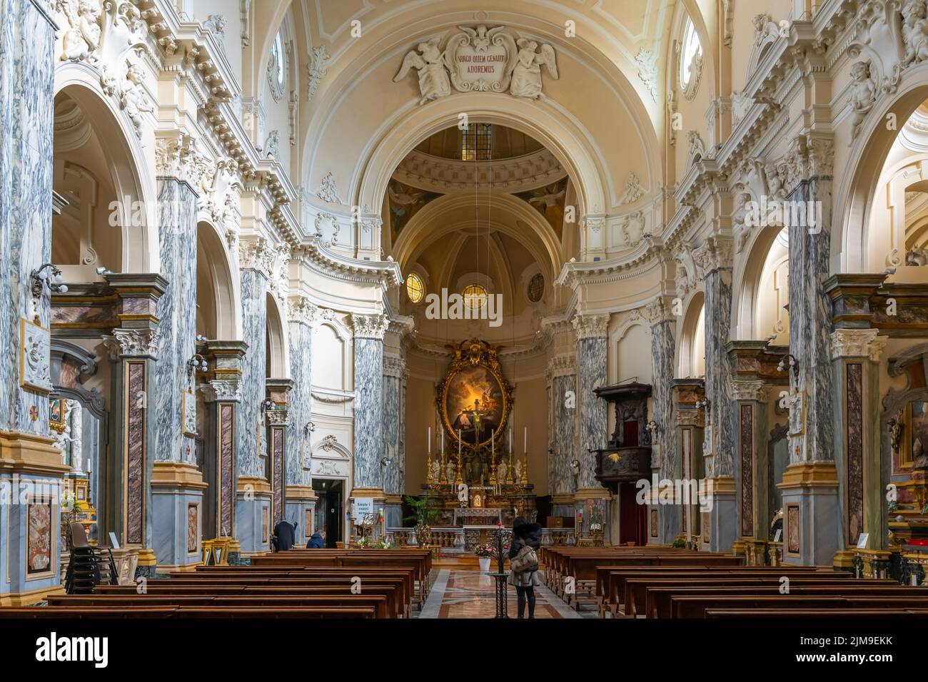 Turin, Italy - February 25, 2022: The interior of the Chiesa della Santissima Annunziata church, with visitors, in Turin, Piedmont, Northern Italy Stock Photo