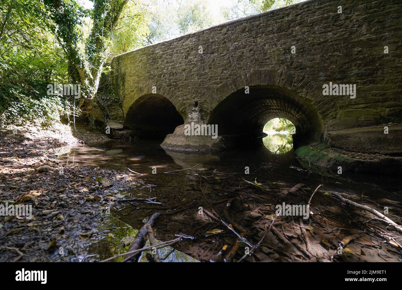 A view of a pools of water under a bridge on the River Thames near to