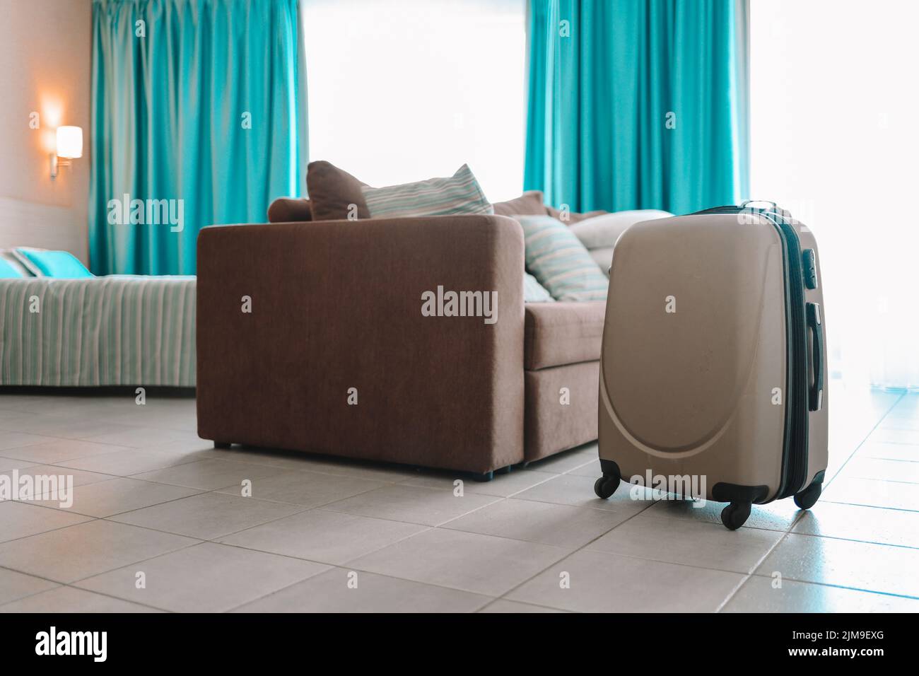 Traveling bag in the hotel room Stock Photo Alamy