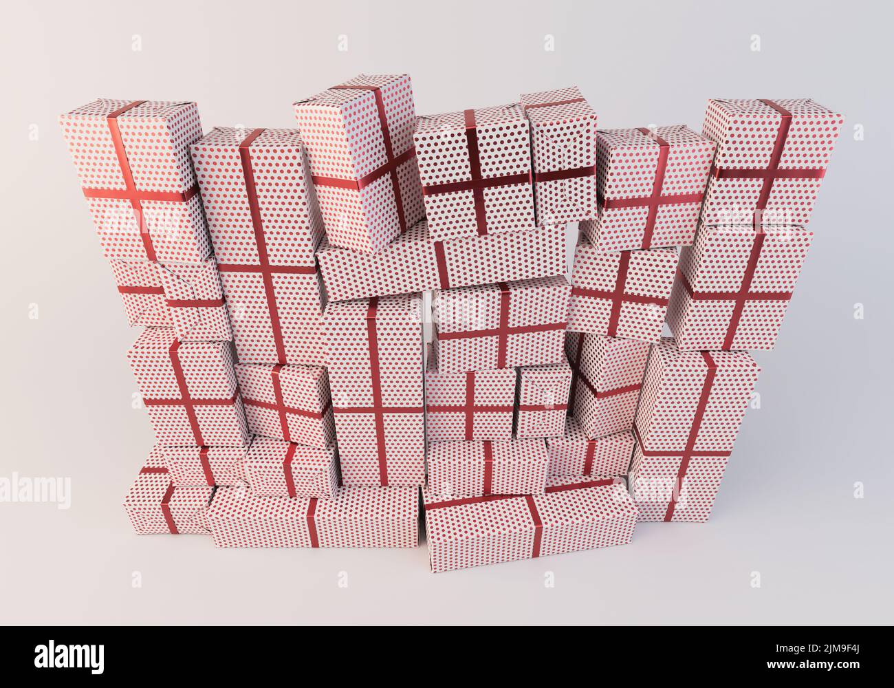 A stacked wall of different sized rectangular gift boxes wrapped in ...