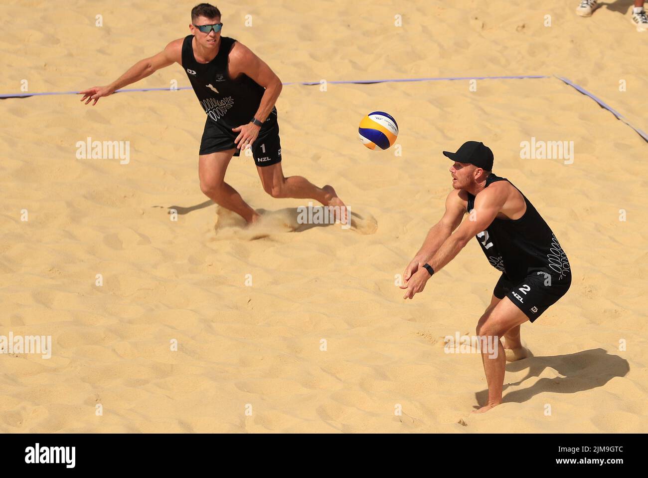New Zealand’s Brad Fuller and Sam O'Dea in action during the Men’s Beach Volleyball Quarter
