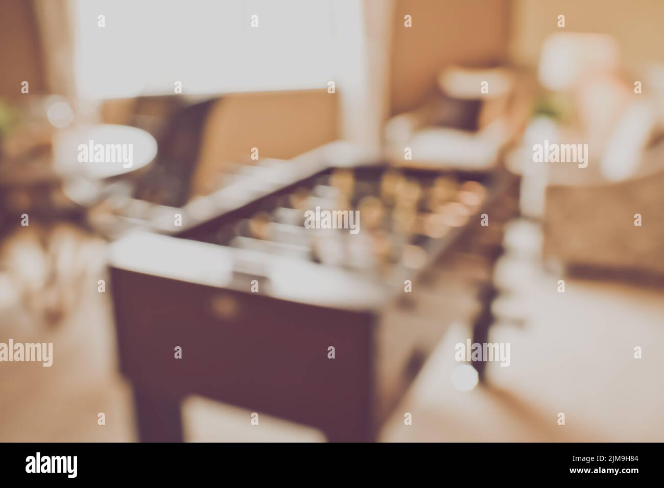 Blurred Foosball Table with vintage instagram style filter Stock Photo