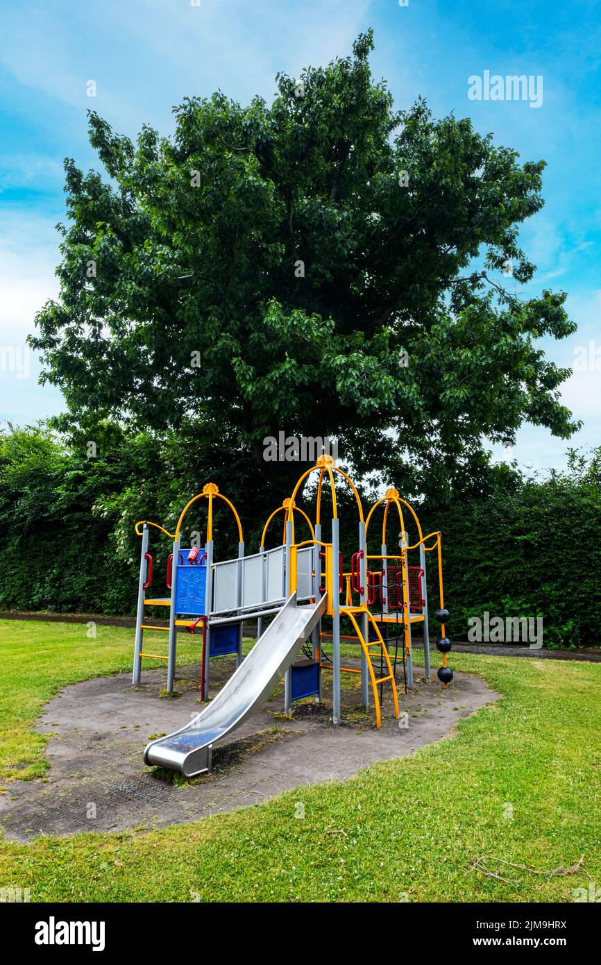 Climbing frame in children playground UK Stock Photo