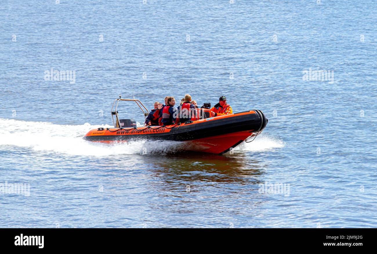 Dundee, Tayside, Scotland, UK. 5th Aug, 2022. UK Weather: A bright sunny day with temperatures reaching 18°C in North East Scotland. Local children from the Ancrum Outdoor Centre have a good time power boating on the River Tay in Dundee. Ancrum Activities offers skill development courses and coaching certification to people of all ages and abilities. Power boating Adventure (Age 8-14yrs) consists of two boats that provide hands-on experience at the helm under the expert supervision of powerboat instructors. Credit: Dundee Photographics/Alamy Live News Stock Photo