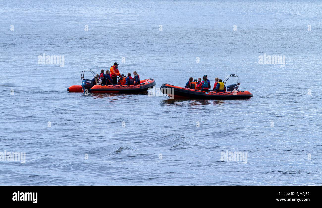 Dundee, Tayside, Scotland, UK. 5th Aug, 2022. UK Weather: A bright sunny day with temperatures reaching 18°C in North East Scotland. Local children from the Ancrum Outdoor Centre have a good time power boating on the River Tay in Dundee. Ancrum Activities offers skill development courses and coaching certification to people of all ages and abilities. Power boating Adventure (Age 8-14yrs) consists of two boats that provide hands-on experience at the helm under the expert supervision of powerboat instructors. Credit: Dundee Photographics/Alamy Live News Stock Photo