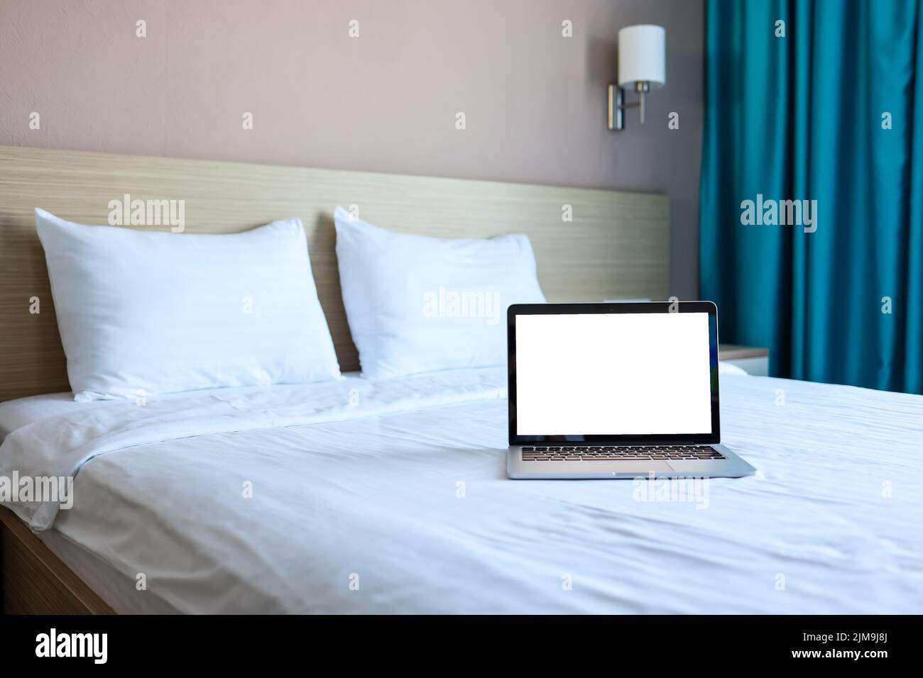 Computer Screen Bed Mock up Blank screen laptop on the bed for advertising and text Stock ...