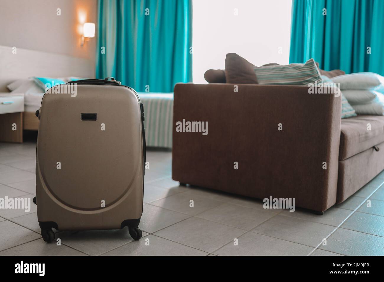 Traveling bag in the hotel room Stock Photo Alamy