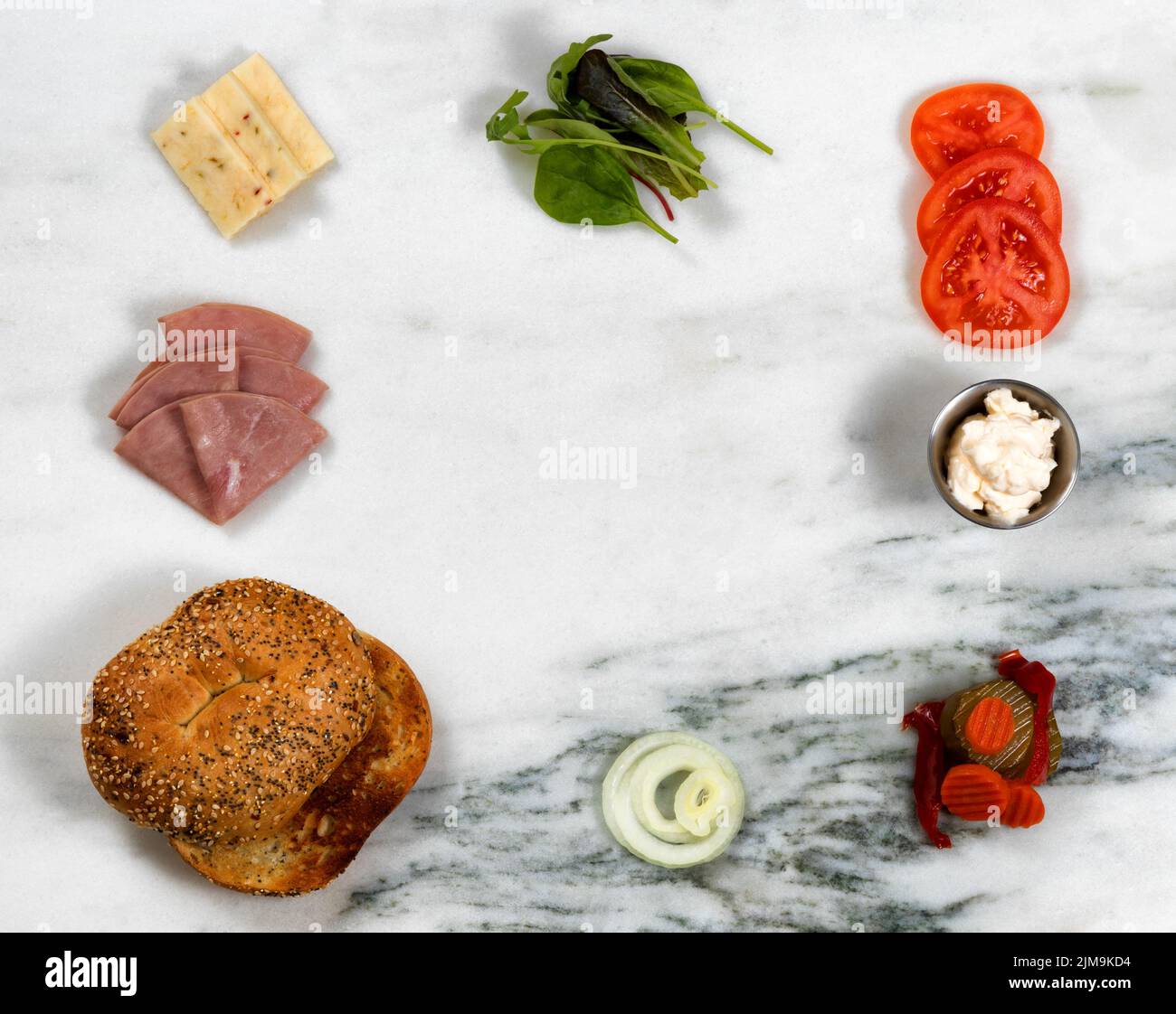 Sandwich ready to be made with fresh ingredients on white marble stone background Stock Photo