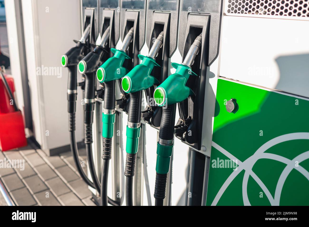 Gasoline and diesel distributor at the gas station. Gas pump nozzles