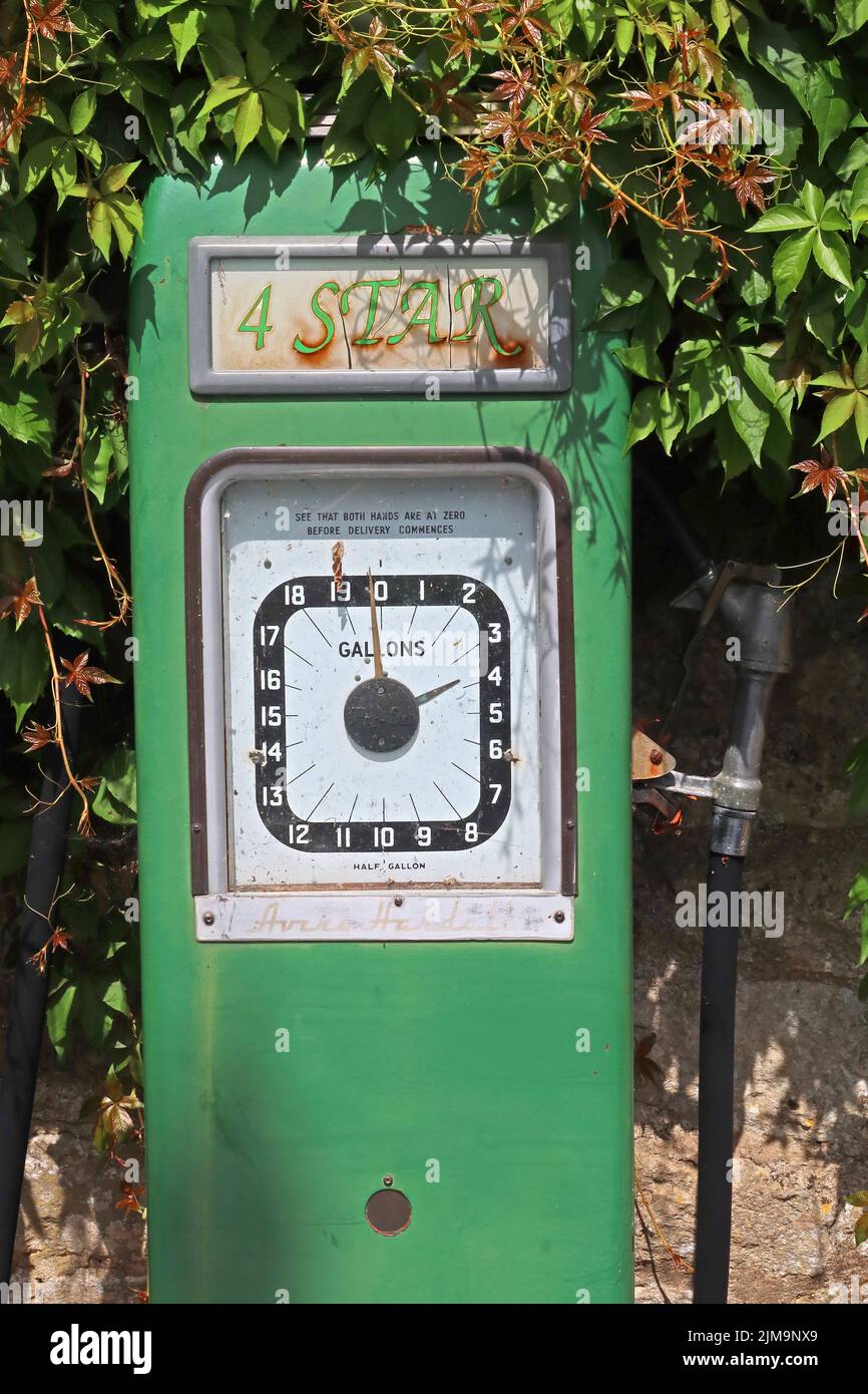 4 Star, green Avery Hardoll four star petrol pump, gallons, Eastcombe, Gloucestershire, England, UK, GL6 7EB Stock Photo