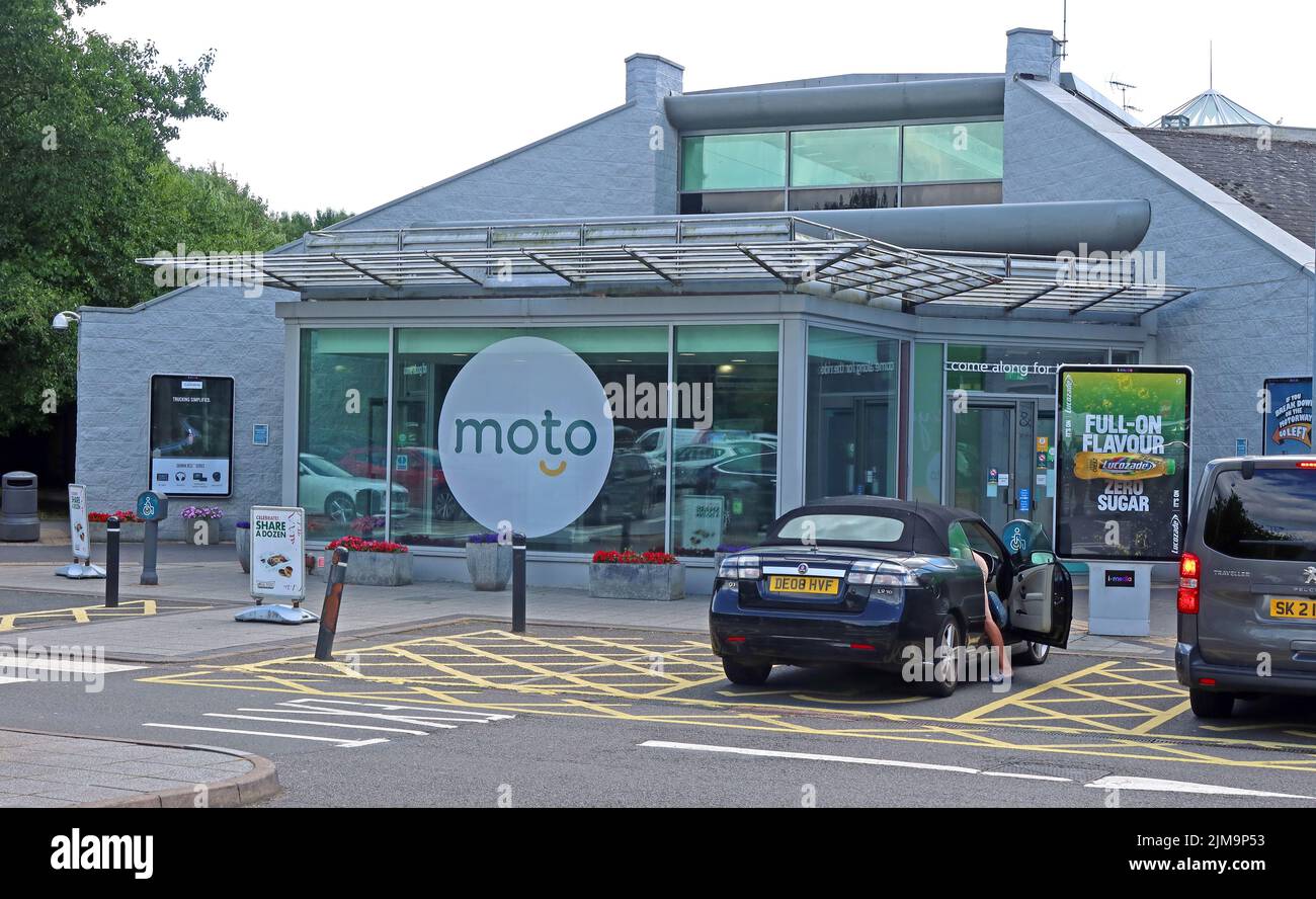 Service station area on M6 north at Stafford, showing new Moto logo 2022 Stock Photo