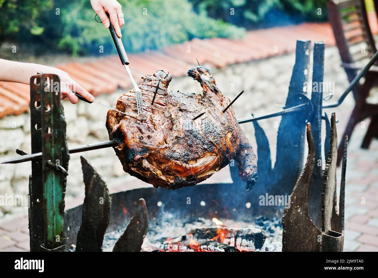 Roasting barbecue is prepared of a ram, lamb or sheep Stock Photo