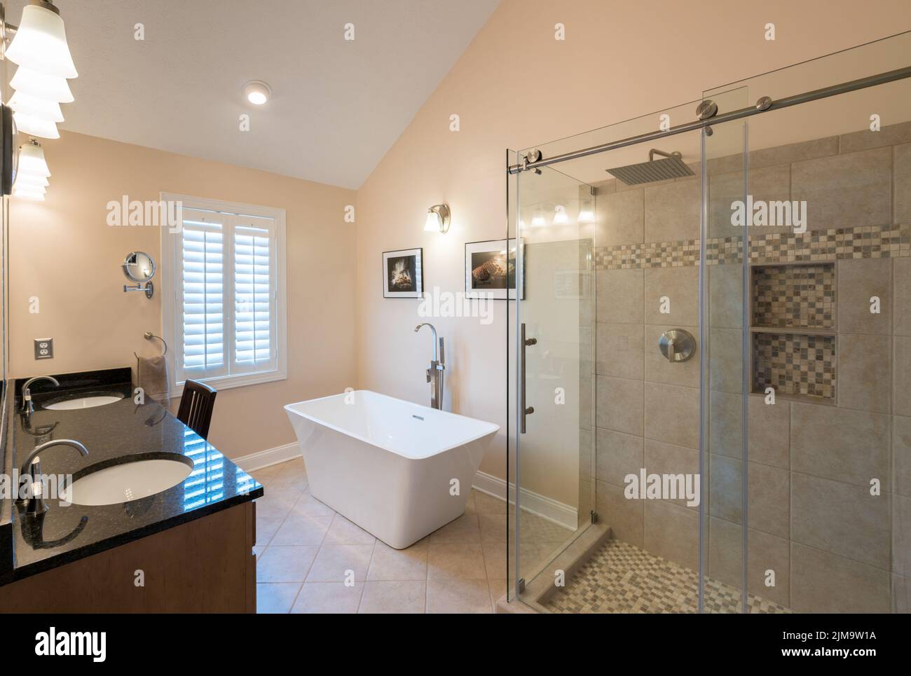 Modern bathroom with freestanding tub and vanity Stock Photo