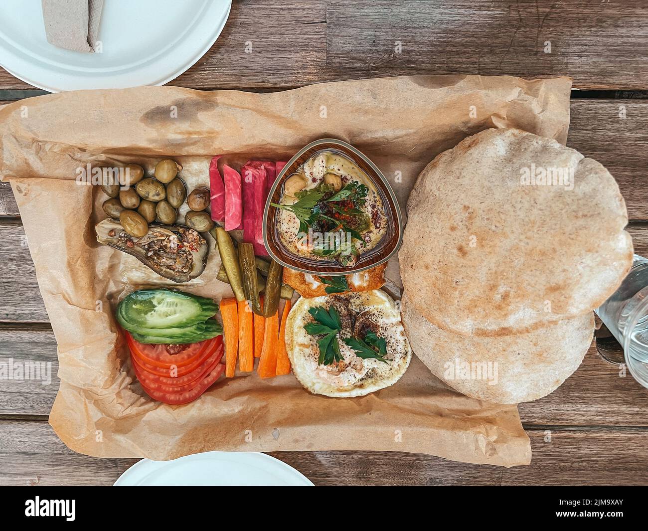 Fancy Lebanese Middle Eastern breakfast, Freshly baked Flatbread of cheese, appetizers - Arabian food manouche - Levantine cuisine Stock Photo